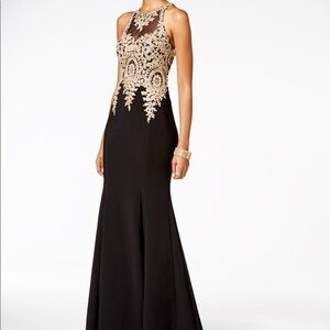 Xscape Black and Gold Prom Dress with Elegant Detailing